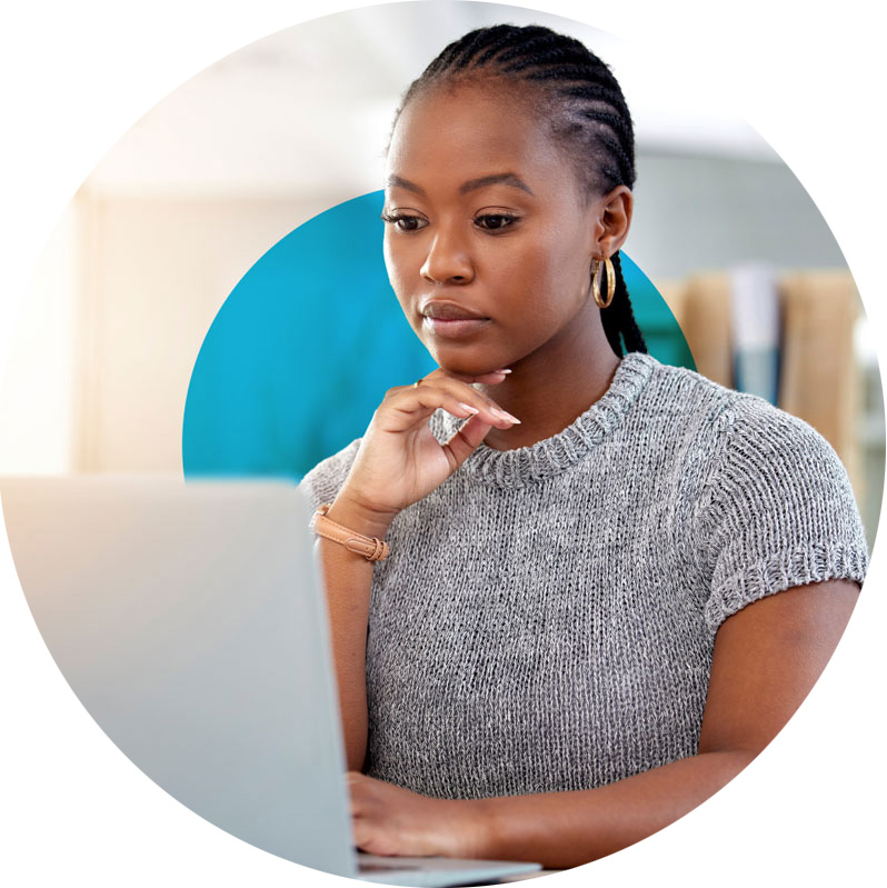 woman looking at a laptop